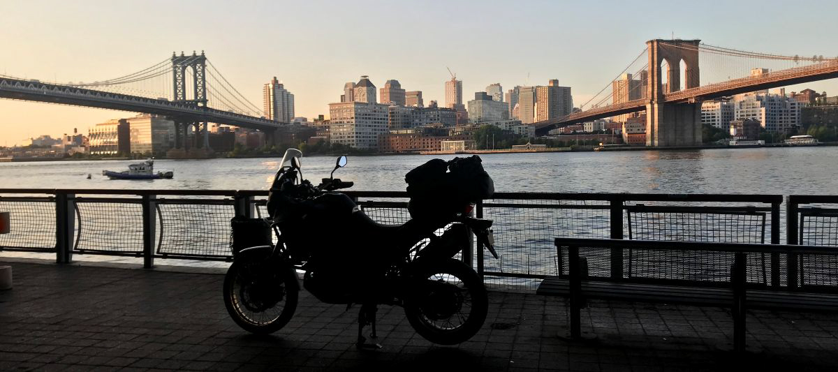 View of New York City's Brooklyn Bridge and Manhattan Bridge from underneath the FDR Drive on South St facing Brooklyn Bridge Park and DUMBO