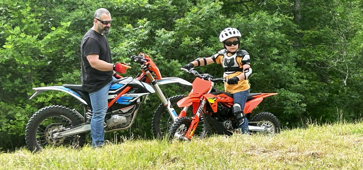 ktm freeeride and sxe5 motorcycles for father and son fun